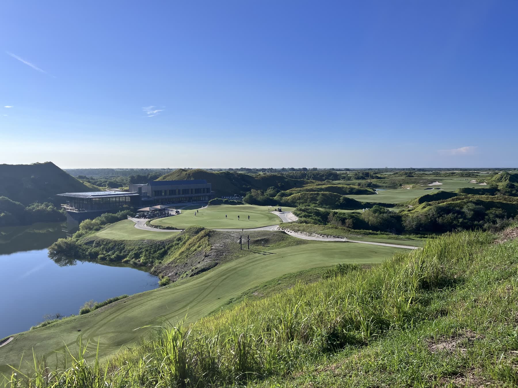 Morning light over the course and clubhouse at Streamsong