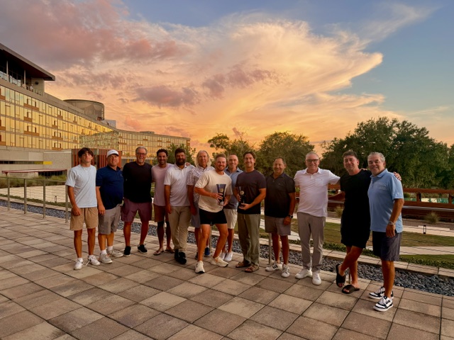 The Links Golf Collective field gathered outside the Streamsong Lodge at sunset